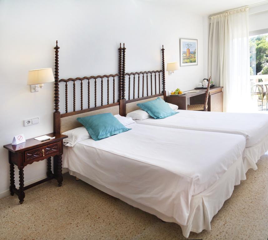 Hotel Apartamentos Cala Сантаньї Екстер'єр фото